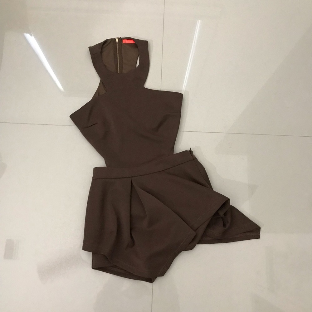 NEVER WORN Sexy Open back open sides romper
